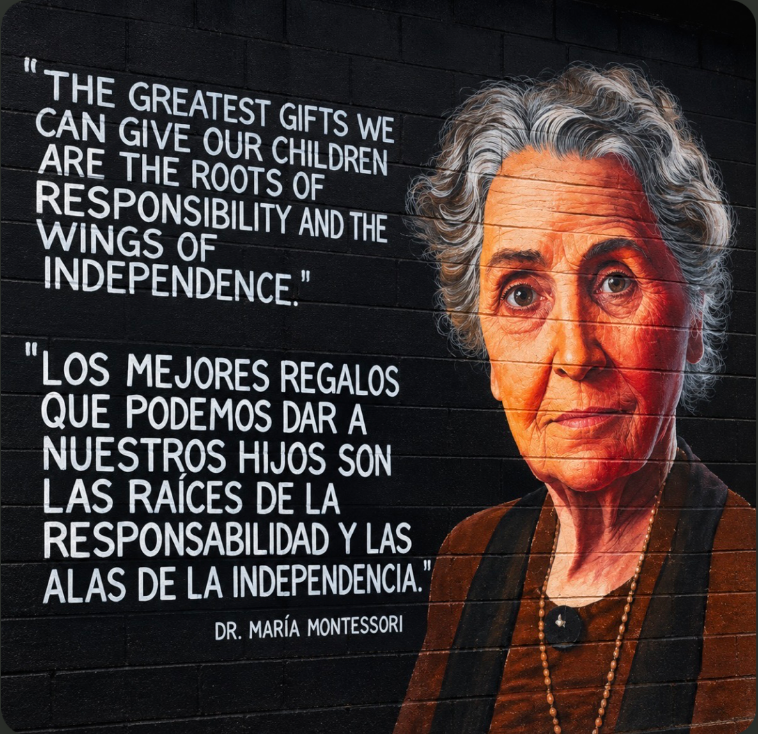 Maria Montessori mural with an inspirational bilingual quote